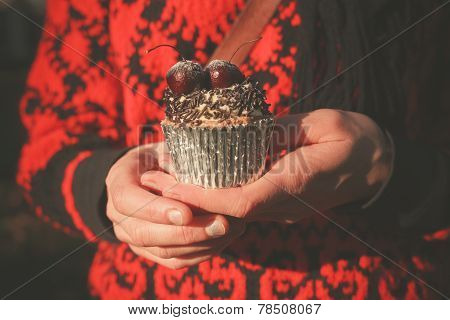 Woman In Park With Cupcake