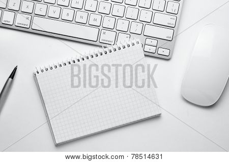 Pen, Notes, Keyboard And Mouse On White Table