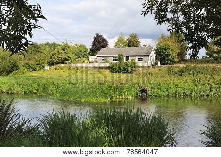 House on the banks of River Suir.