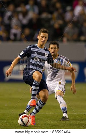CARSON, CA. - APR 18: Dan Gargan & Krisztian Nemeth (L) in action during the L.A. Galaxy game against Sporting Kansas City on April 18, 2015 at the StubHub Center in Carson, California.