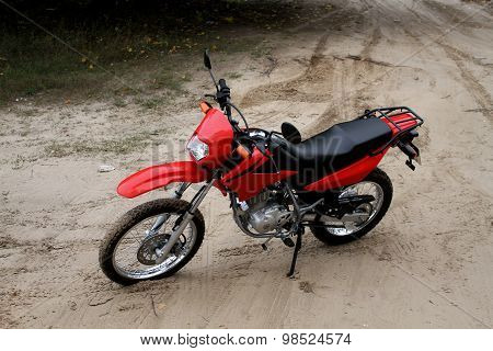 Enduro motorcycle on the ground road