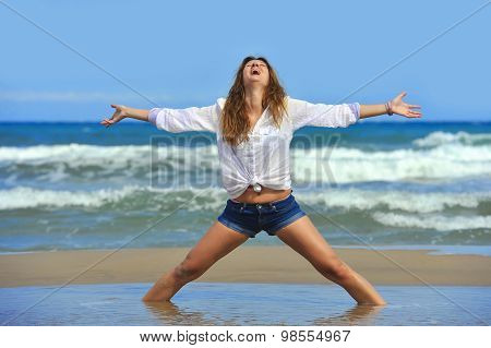Young Attractive Woman In Shorts In Relax At Beach In Freedom Co