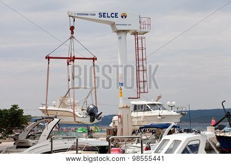 SELCE, CROATIA - JULY 24, 2015: A boat lift in Marina Selce
