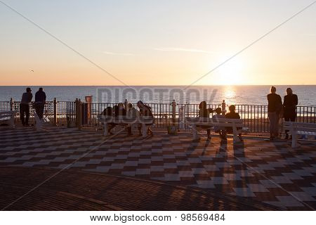 People Enjoying Sunset In Zandvoort, Holland
