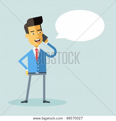 Handsome asian american manager talking on phone