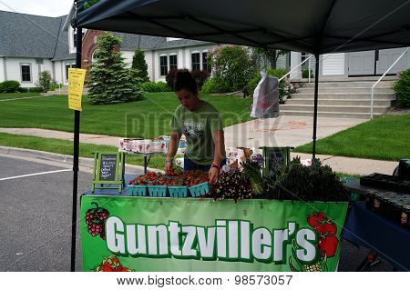 Woman Displays Strawberries