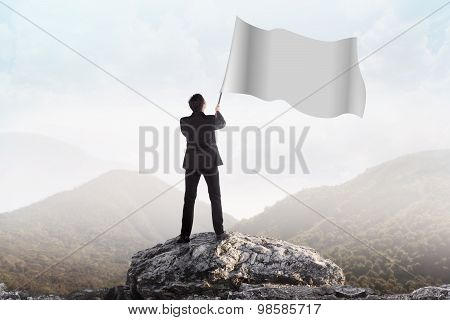 Successful Man Waving Blank Flag