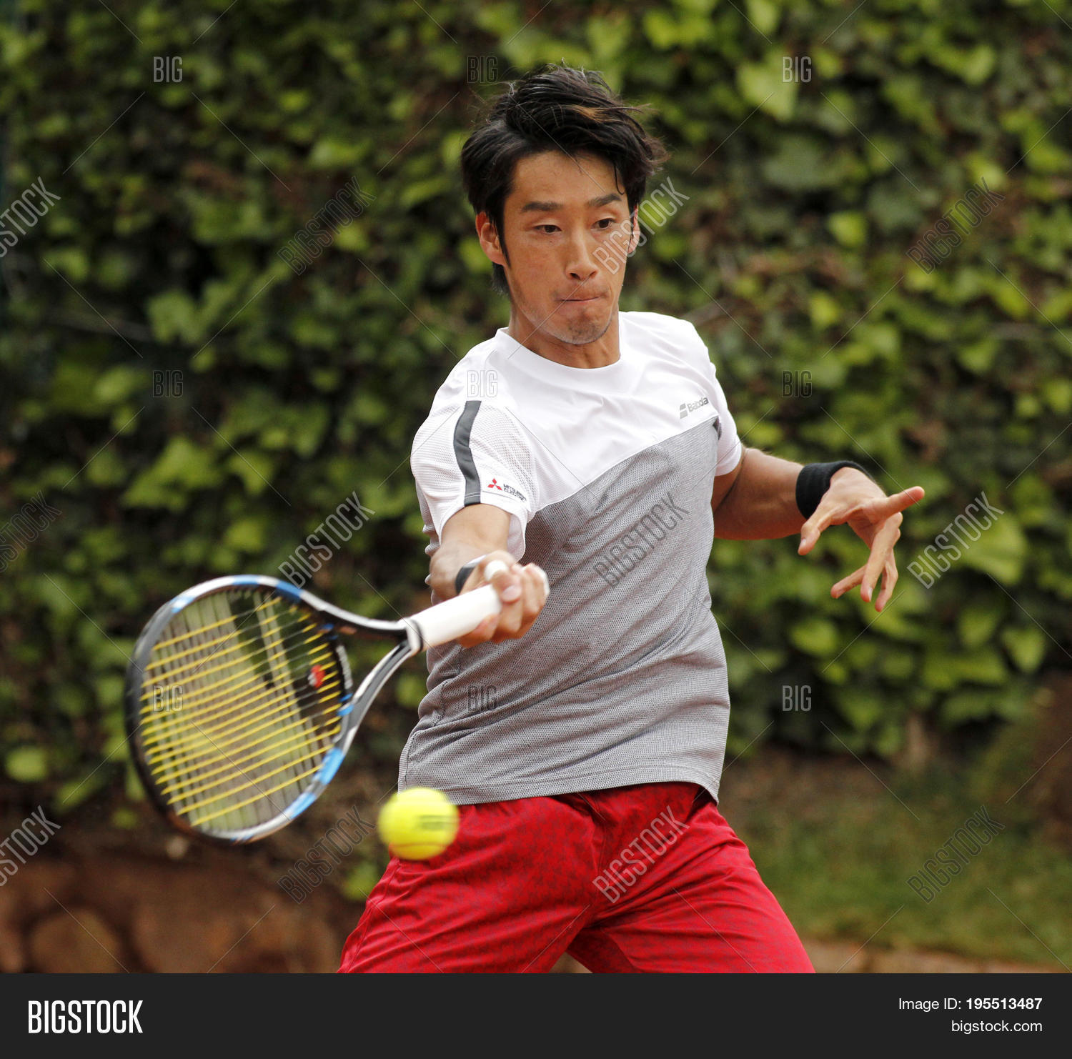 BARCELONA, SPAIN - APRIL, 27: Japanese tennis player Yuichi Sugita in actio...