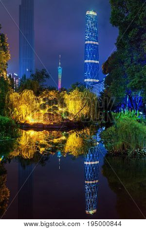 The Canton Tower Reflected In Pond, Guangzhou, China