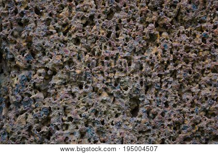 Brown Purple Old Laterite Stone texture close up