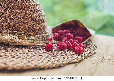 Summer Holiday, Vacation, Relaxation Concept. Raspberries, Straw Hat. Free Text Copy Space. Summer V