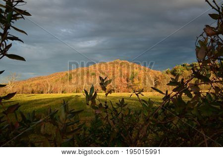 Shenandoah mountain illuminated fall landscape dark stormy day