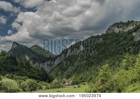 Sokolica hill from Lesnica village in summer sunny day