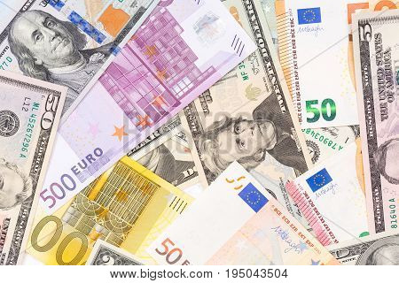 Background made from euro and dollar banknotes.  High resolution photo.