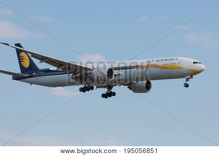 LONDON UK - JULY 9 2017: Plane Boeing 777 Jet Airways Airlines landing at London Heathrow Airport