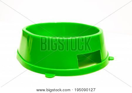 green empty plastic bowl for feeding animals