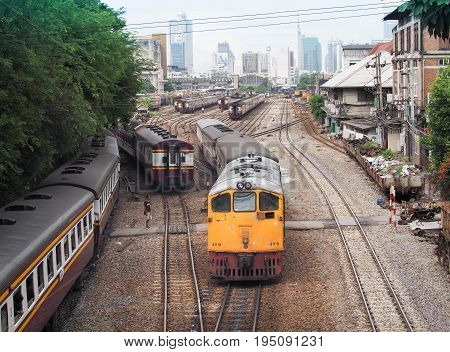 BANGKOK, THAILAND - July 10,2017: Trains moveing out from platform of railway station Hua Lamphong. Hua Lamphong station opened in 1916 and serves apprx 70,000 passengers and 150 trains each day
