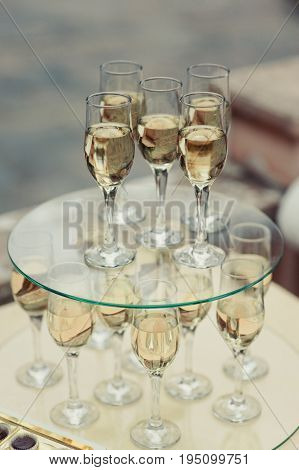 Many Glasses On A Table With Alcohol And Without