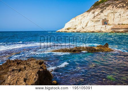 The north of Israel. The grottoes of Rosh Ha Nikra. Rocks of white limestone on the border with Lebanon on the Mediterranean coast