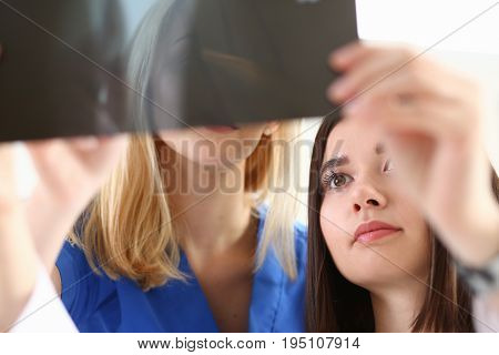 Group Of Doctors Hold In Hand Xray Photography