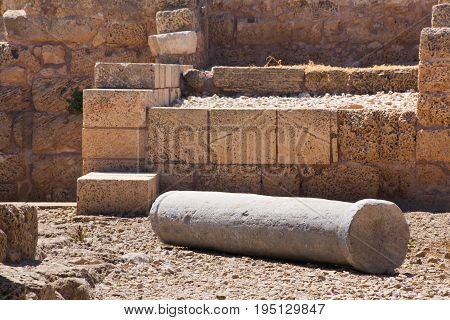 Roman falled stone pillar in cesarea Archaeological site close to Herod the Great hippodrome