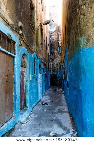Alley in blue city of marrakech in morocco