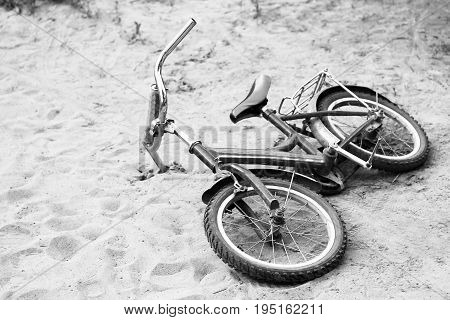 At The End Of A Journey. Bicycle Lying On The Beach.