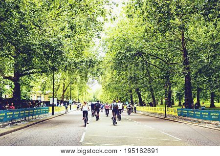 LONDON UNITED KINGDOM - July 30th 2016: People riding their bikes at the Prudential Race in London city centre street