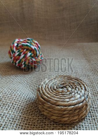 Two different toys made in rope and wool for cats