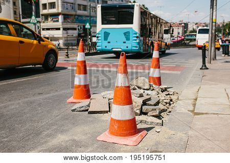 Road cone on the road. Road sign. Road works on the streets of Istanbul in Turkey. Sign.