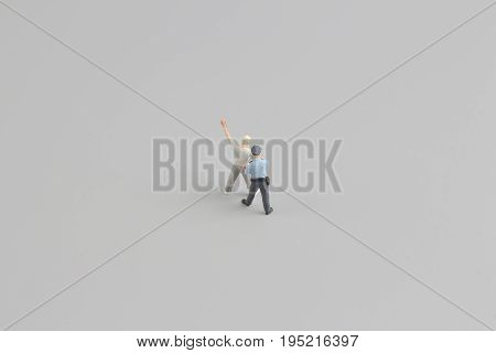 Mini Figure Of Policeman With Hand Cuffs