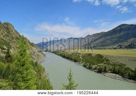 Katun river flows between hills in Altai mountains. Altay Republic Siberia Russia.
