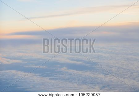 the sky above the clouds from aircraft iljuminatora at sunset