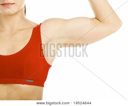 muscular woman posing against white background