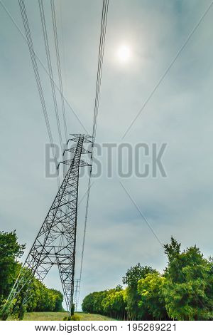 high voltage post.High-voltage tower sky background Twilight photo of power plant