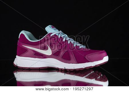 Afife, Portugal - April 8, 2017: Nike Running boots. Nike, multinational company. Isolated on Background. Product shots