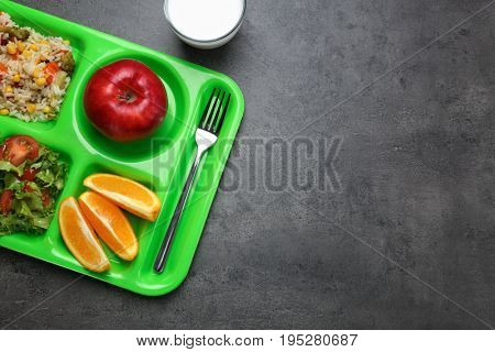 Serving tray with delicious food on table. Concept of school lunch