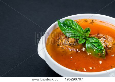 Vegetarian borscht basil Close up. Black background