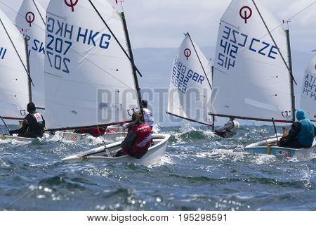23 July 2015, Young sailors from around the World compete at the 2015 European Optimist Sailing Championships, held at the Welsh National Sailing Centre, Plas Heli, Wales. 