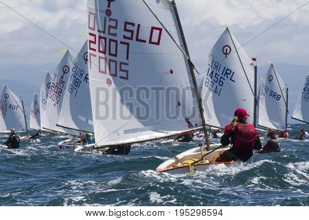 23 July 2015, Young sailors from around the World compete at the 2015 European Optimist Sailing Championships, held at the Welsh National Sailing Centre, Plas Heli, Wales. 