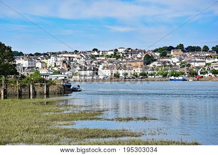 Bideford North Devon England 13th July 2017 - The quay and old bridge in the port of Bideford in North Devon England taken from the Tarka Trail looking west across the river Torridge