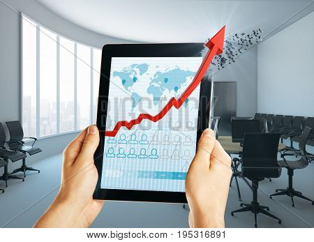 Hands holding tablet with abstract financial report in modern office interior with city view. Technology and income concept. 3D Rendering