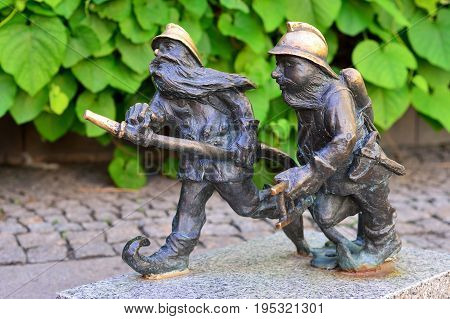 WROCLAW POLAND - JUNE 2017: Wroclaw attractions fire dwarfs.