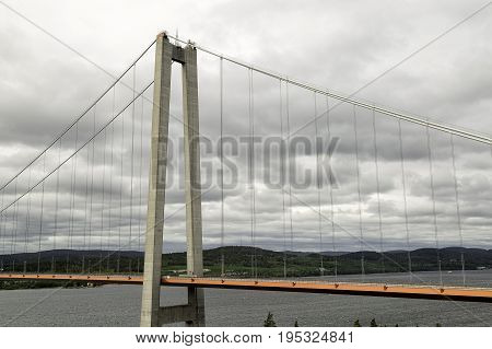 The High Coast Bride in Sweden with a cloudy sky.