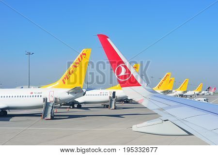 ISTANBUL TURKEY - APRIL 2017: Sabiha Gokcen airport. Airport jetway aerobridge skybridge. Airport air bridge. Pegasus and turkish airlines aircraft.