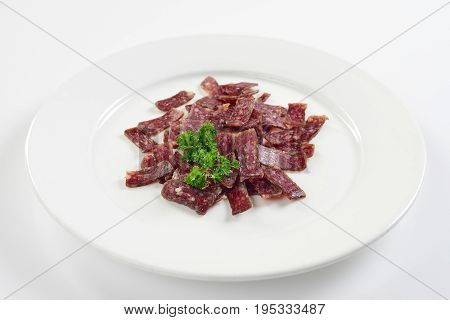 Jerky. Sujuk. Snack to beer. On white background menu concept.