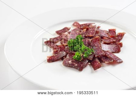 Jerky. Sujuk. Snack to beer. On white background menu concept.
