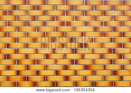 Beautiful texture of brick in red and yellow colors for use as a background