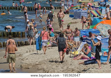 USTRONIE MORSKIE, WEST POMERANIAN / POLAND: Holiday day on the Baltic Sea beach