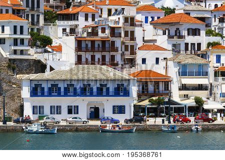 SKOPELOS, GREECE - JUNE 14, 2017: View of the harbour in Skopelos town, Greece on June 14, 2017.